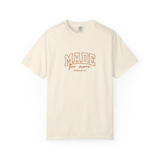 Made for More Christian t-shirt featuring Ephesians 2:10 scripture in stylish collegiate lettering on an ivory Comfort Colors tee, inspirational faith-based apparel for everyday wear and gifts.