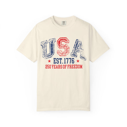 Ivory patriotic USA Shirt featuring vintage American flag graphics, fireworks, and distressed USA-inspired design for 4th of July celebrations and USA 250 anniversary apparel
