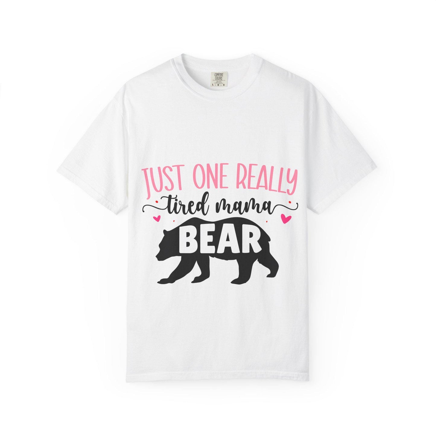 White Comfort Colors short sleeve t-shirt featuring the phrase “Just One Really Tired Mama Bear” in playful pink and black fonts. The design includes a bold black silhouette of a walking bear with the word “BEAR” in pink block letters inside the bear, and small pink hearts for added charm. A cozy, fun, and relatable shirt for moms, perfect for Mother’s Day, new moms, or as a comfy everyday mom life tee.