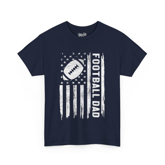 Navy short-sleeve t-shirt featuring a bold white distressed American flag design with a football in place of the stars and “FOOTBALL DAD” written vertically in bold letters. Perfect for proud football dads, this sporty and patriotic tee makes a great Father's Day or game day gift. The design combines love for the sport and fatherhood in a rugged, vintage style, ideal for dads who support their football-playing kids.