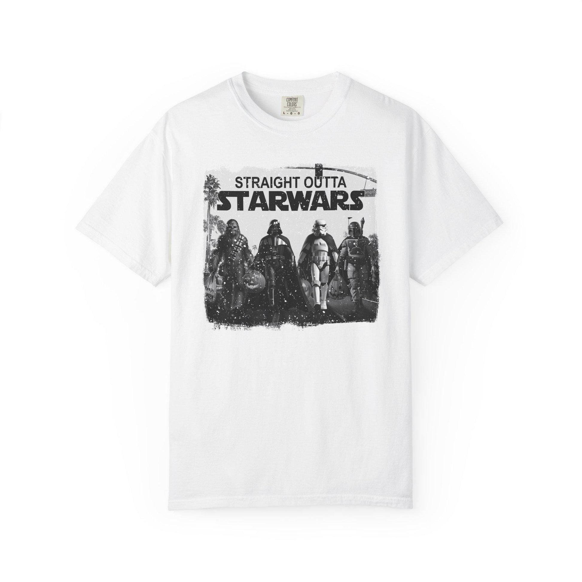 White short-sleeve graphic t-shirt featuring a black and white design with iconic Star Wars characters including Chewbacca, Darth Vader, Stormtrooper, and Boba Fett walking together across a crosswalk. Above them, bold text reads “Straight Outta Starwars.” The print has a distressed, vintage style with palm trees and a traffic light in the background, blending pop culture and urban streetwear vibes.